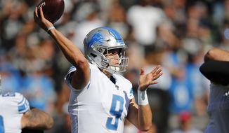 Detroit Lions quarterback Matthew Stafford (9) passes against the Oakland Raiders during the first half of an NFL football game in Oakland, Calif., Sunday, Nov. 3, 2019. (AP Photo/John Hefti)