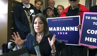 Democratic presidential candidate author Marianne Williamson speaks to the media after she filed to be listed on the ballot for the New Hampshire primary, Monday, Nov. 4, 2019, in Concord, N.H. (AP Photo/Holly Ramer)