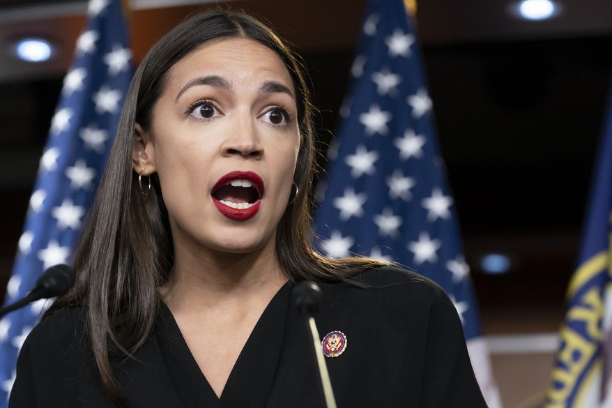 In this July 15, 2019, file photo Rep. Alexandria Ocasio-Cortez, D-N.Y., holds a news conference at the Capitol in Washington. (AP Photo/J. Scott Applewhite, File) 