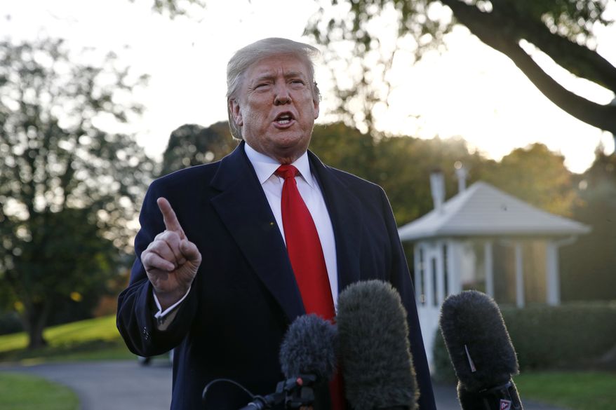 President Donald Trump speaks to members of the media on the South Lawn of the White House in Washington, Monday, Nov. 4, 2019, before boarding Marine One for a short trip to Andrews Air Force Base, Md., and then on to Lexington, Ky., for a campaign rally. (AP Photo/Patrick Semansky)