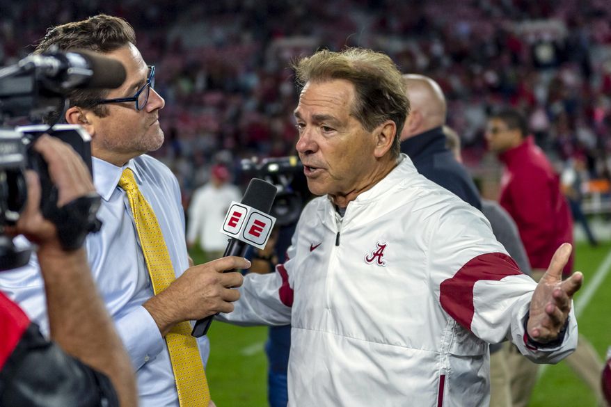 Alabama head coach Nick Saban talks with ESPN after an NCAA college football game against Arkansas, Saturday, Oct. 26, 2019, in Tuscaloosa, Ala. (AP Photo/Vasha Hunt)