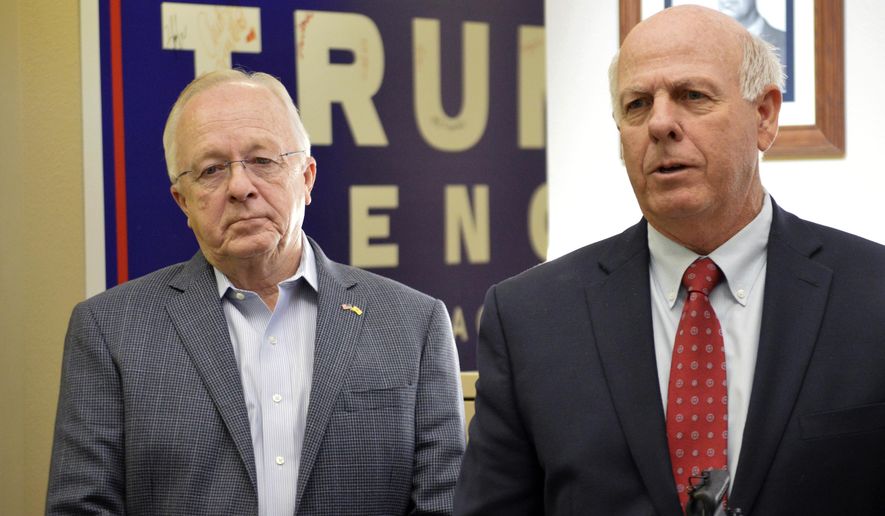 New Mexico Republican House Minority Leader James G. Townsend, left, and Republican Party of New Mexico chairman Steve Pearce, right, talk to reporters on Monday, Nov. 4, 2019, in Albuquerque after announcing the party will challenge how the state is counting absentee ballots. The Republican Party of New Mexico said Monday it is suing the state's Secretary of State and a southern county clerk to halt the counting of absentee ballots after questions arose if the ballots were following requirements under a 2019 state law. (AP Photo/Russell Contreras)