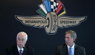 Penske Corporation Chairman Rodger Penske, left, responds to a question as Hulman &amp;amp; Co. Chairman Tony Hulman George looks on during a news conference at Indianapolis Motor Speedway in Indianapolis Monday, Nov. 4, 2019. Indianapolis Motor Speedway and the IndyCar Series were sold to Penske Entertainment Corp. in a stunning move Monday that relinquishes control of the iconic speedway from the Hulman family after 74 years.  (AP Photo/AJ Mast)