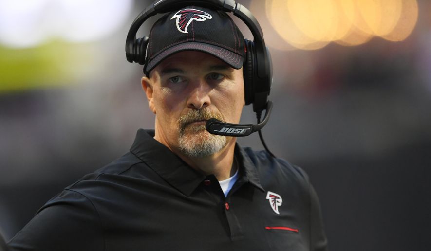 Atlanta Falcons head coach Dan Quinn stands on the sidelines during the first half of an NFL football game against the Seattle Seahawks, Sunday, Oct. 27, 2019, in Atlanta. (AP Photo/John Amis)