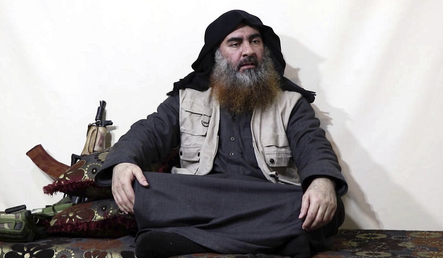 This file image made from video posted on a militant website April 29, 2019, purports to show the leader of the Islamic State group, Abu Bakr al-Baghdadi being interviewed by his group&#39;s Al-Furqan media outlet. In his last months on the run, al-Baghdadi was agitated, fearful of traitors, sometimes disguised as a shepherd, sometimes hiding underground, always dependent on a shrinking circle of confidants. (Al-Furqan media via AP, File)
