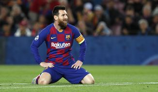 Barcelona&#39;s Lionel Messi reacts after missing a scoring chance during a Champions League Group F soccer match between Barcelona and Slavia Praha at Camp Nou stadium in Barcelona, Spain, Tuesday, Nov. 5, 2019. (AP Photo/Joan Monfort)