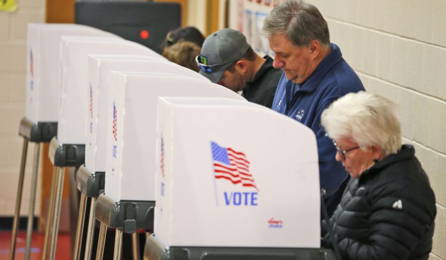 Voters cast their ballots at a polling station in Richmond, Va., Tuesday, Nov. 5, 2019. All seats in the Virginia House of Delegates and State Senate are up for election. (AP Photo/Steve Helber) **FILE**