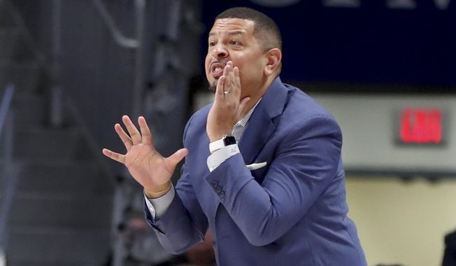 Pittsburgh coach Jeff Capel shouts to his team during the first half of an NCAA college exhibition basketball game against Slippery Rock on Wednesday, Oct. 30, 2019, in Pittsburgh. (AP Photo/Keith Srakocic)