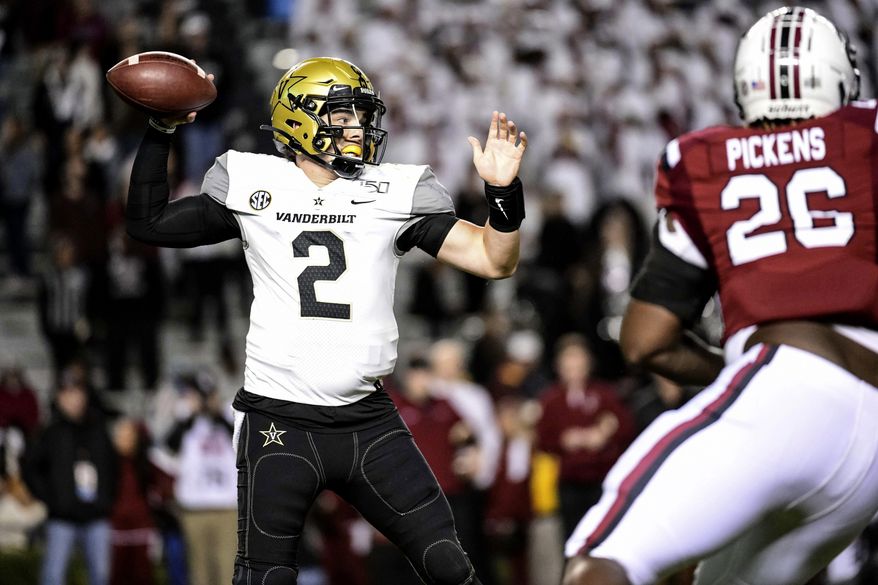 Vanderbilt quarterback Deuce Wallace (2) attempts a pass during the second half of an NCAA college football game against South Carolina, Saturday, Nov. 2, 2019, in Columbia, S.C. (AP Photo/Sean Rayford)
