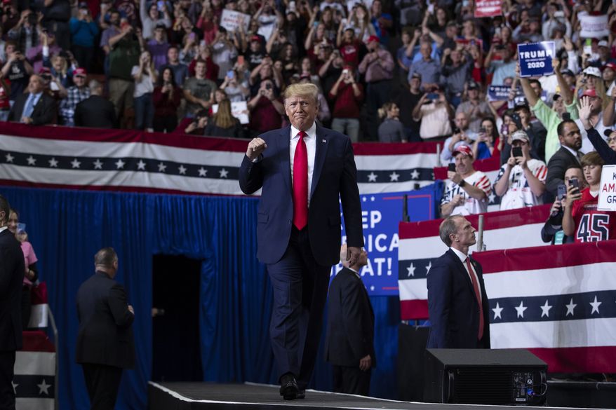 President Donald Trump arrives to speak at a campaign rally at the Monroe Civic Center, Wednesday, Nov. 6, 2019, in Monroe, La. (AP Photo/ Evan Vucci)