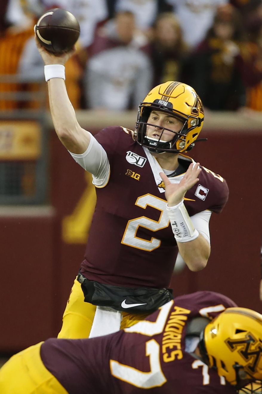 FILE - In this Oct. 5, 2019, file photo, Minnesota quarterback Tanner Morgan (2) passes against Illinois in the second half of an NCAA college football game, in Minneapolis. Penn State (8-0) plays against Minnesota (8-0) on Saturday, Nov. 9. (AP Photo/Bruce Kluckhohn, File)