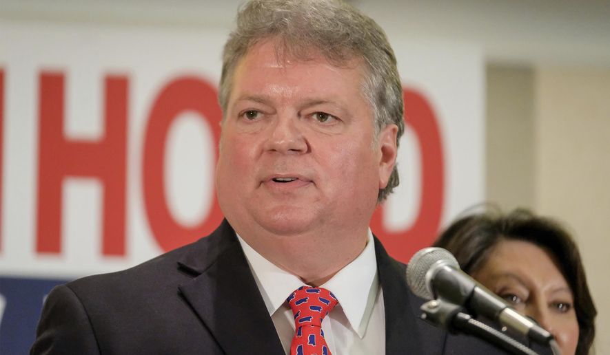 Democratic candidate and state Attorney General Jim Hood talks to his supporters after conceding to Gov.-elect Tate Reeves, Tuesday, Nov. 5, 2019, at Hilton Gardens Inn in Jackson, Miss. (AP Photo/Charles A. Smith)