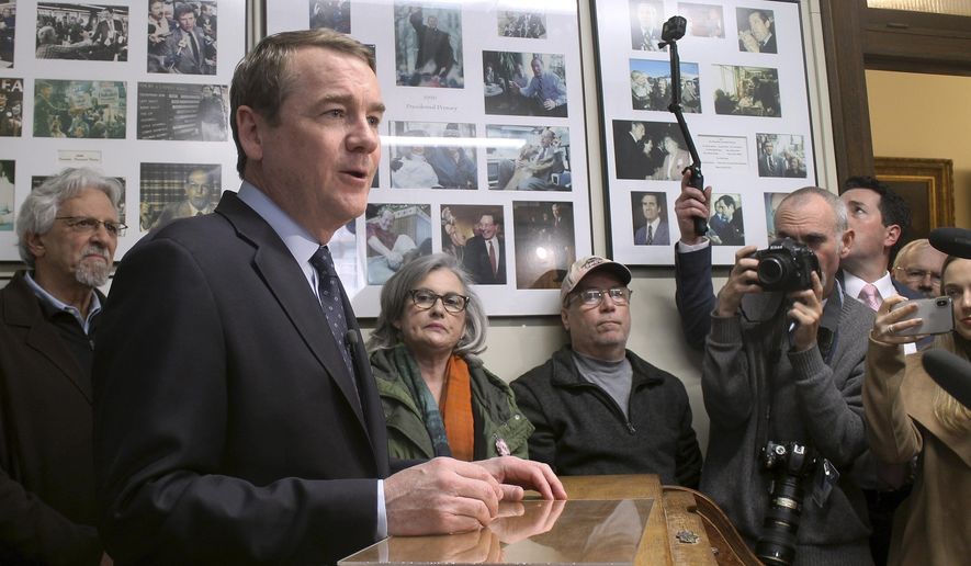 Democratic presidential candidate Sen. Michael Bennet, D-Colo., stands in the New Hampshire secretary of state&#39;s office on Wednesday, Nov. 6, 2019, in Concord, N.H., after filing to be on the state&#39;s first-in-the-nation presidential primary ballot. (AP Photo/Holly Ramer)