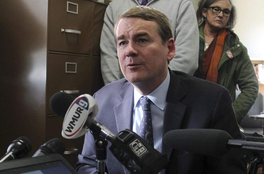 Democratic presidential candidate Sen. Michael Bennet, D-Colo., speaks to the media in the New Hampshire secretary of state&#39;s office on Wednesday, Nov. 6, 2019, in Concord, N.H., after filing to be on the state&#39;s first-in-the-nation presidential primary ballot. (AP Photo/Holly Ramer)