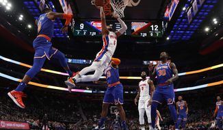 Detroit Pistons guard Bruce Brown (6), defended by New York Knicks guard Frank Ntilikina (11) makes a layup during the first half of an NBA basketball game, Wednesday, Nov. 6, 2019, in Detroit. (AP Photo/Carlos Osorio)
