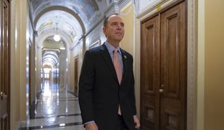 Rep. Adam Schiff, chairman of the House Intelligence Committee, walks to a secure area at the Capitol to interview a witness in the House impeachment inquiry on President Donald Trump&#x27;s efforts to press Ukraine to investigate his political rivals, in Washington, Wednesday, Nov. 6, 2019.  (AP Photo/J. Scott Applewhite)