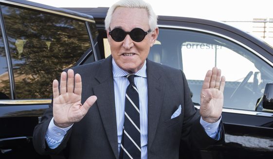Roger Stone arrives at Federal Court for the second day of jury selection for his federal trial, in Washington, Wednesday, Nov. 6, 2019. Stone, a longtime Republican provocateur and former confidant of President Donald Trump, goes on trial over charges related to his alleged efforts to exploit the Russian-hacked Hillary Clinton emails for political gain. (AP Photo/Cliff Owen)