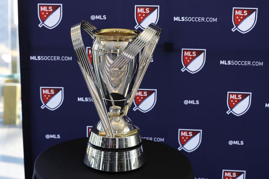 The MLS Cup trophy is displayed Tuesday, Nov. 5, 2019, in Seattle. The Seattle Sounders are scheduled to face Toronto FC on Sunday in the MLS Cup soccer match at CenturyLink Field in Seattle, the third time the two teams have met for the MLS championship. (AP Photo/Ted S. Warren)