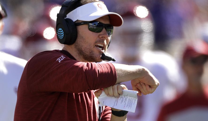 Oklahoma head coach Lincoln Riley calls for a time out during the second half of an NCAA college football game against Kansas State, Saturday, Oct. 26, 2019, in Manhattan, Kan. Kansas State won 48-41. (AP Photo/Charlie Riedel)
