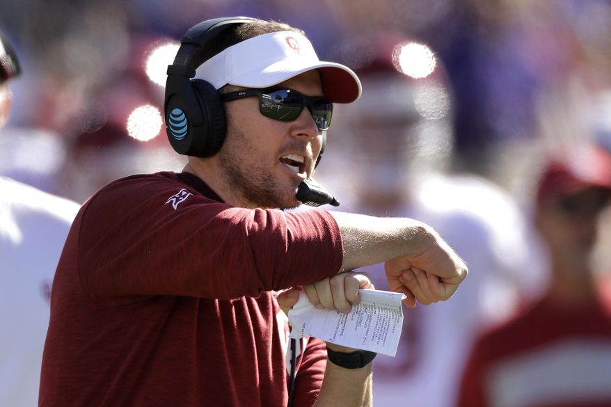 Oklahoma head coach Lincoln Riley calls for a time out during the second half of an NCAA college football game against Kansas State, Saturday, Oct. 26, 2019, in Manhattan, Kan. Kansas State won 48-41. (AP Photo/Charlie Riedel)
