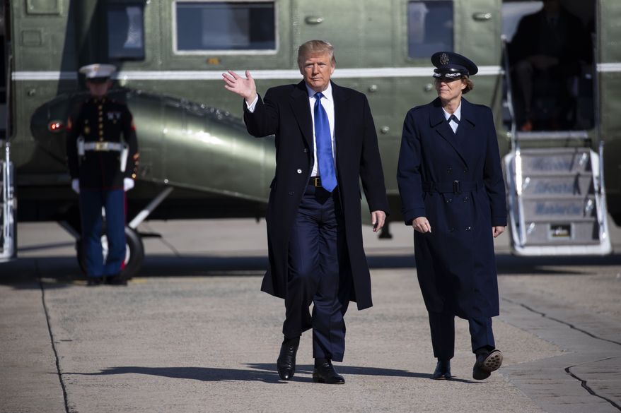President Donald Trump walks to board Air Force One for a trip to Atlanta to attend a fundraiser, and participate in the launch of "Black Voices for Trump," Friday, Nov. 8, 2019, in Andrews Air Force Base, Md. (AP Photo/ Evan Vucci)