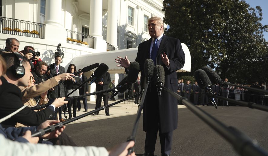 President Donald Trump speaks to reporters on the South Lawn of the White House in Washington, Friday, Nov. 8, 2019, before boarding Marine One for a short trip to Andrews Air Force Base, Md. and then on to Georgia to meet with supporters. (AP Photo/Andrew Harnik)