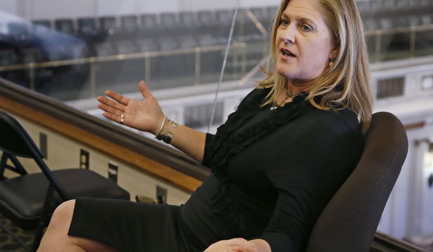 FILE - In this April 10, 2017, file photo, Trust Women's founder and CEO Julie Burkhart is pictured during an interview at the state Capitol in Oklahoma City. The Oklahoma City abortion clinic filed a lawsuit Friday, Nov. 8, 2019, challenging longstanding state laws that allow only physicians to perform abortions in Oklahoma, marking the sixth time in the past five years that the state's abortion restrictions have ended up in court. The lawsuit, which was filed on behalf of the Trust Women clinic, contends that such laws are unconstitutional because they restrict women's access to abortion without any valid medical basis. (AP Photo/Sue Ogrocki, File)