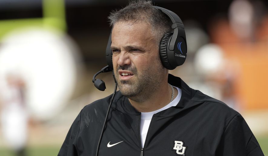 FILE - In this Oct. 13, 2018, file photo, Baylor head coach Matt Rhule watches from the sideline during the first half of an NCAA college football game against Texas, in Austin, Texas. Rhule may have only been joking when he said he sometimes still wakes up in the middle of the night haunted by the memory of those highlight plays TCU’s Jalen Reagor made against the Bears last season. But that was in the last loss for the Bears, when Reagor pretty much single-handedly beat them by turning a screen pass into a 65-yard touchdown and running 37 yards for a score on a fourth-and-1 reverse. (AP Photo/Eric Gay, File)