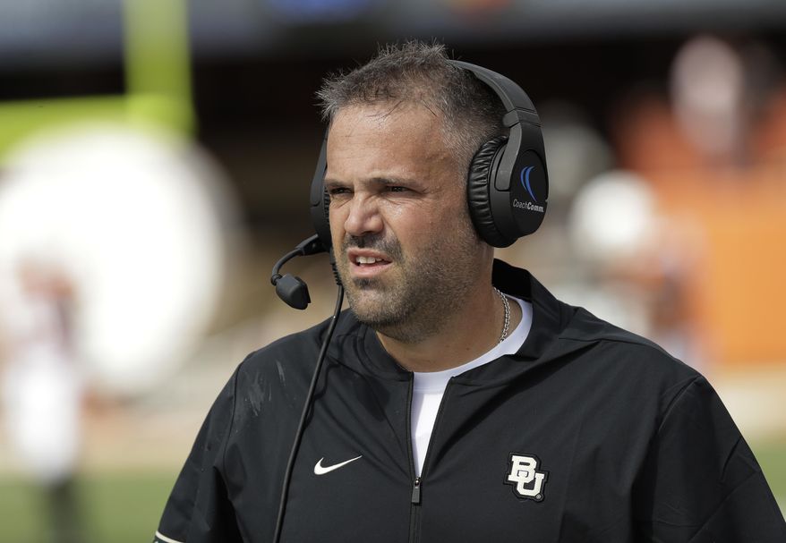 FILE - In this Oct. 13, 2018, file photo, Baylor head coach Matt Rhule watches from the sideline during the first half of an NCAA college football game against Texas, in Austin, Texas. Rhule may have only been joking when he said he sometimes still wakes up in the middle of the night haunted by the memory of those highlight plays TCU’s Jalen Reagor made against the Bears last season. But that was in the last loss for the Bears, when Reagor pretty much single-handedly beat them by turning a screen pass into a 65-yard touchdown and running 37 yards for a score on a fourth-and-1 reverse. (AP Photo/Eric Gay, File)