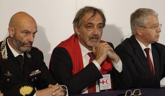 From left, Carabinieri Anti-terrorism Colonel Marco Rosi, IFRC President Francesco Rocca, and Albania&#39;s Interior Minister Sander Lleshaj, attend a press conference at Rome&#39;s Fiumicino airport Friday, Nov. 8, 2019. 11-year-old Alvin, an Albanian boy who was taken to Syria by his mother when she joined the Islamic State group has been freed from a crowded detention camp in northeastern Syria and returned home to Italy where his father lives. (AP Photo/Gregorio Borgia)