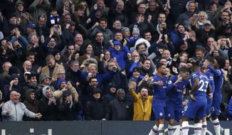 Chelsea&#39;s Christian Pulisic celebrates with teammates after scoring his sides second goal during their English Premier League soccer match between Chelsea and Crystal Palace at Stamford Bridge stadium in London, Saturday, Nov. 9, 2019. (AP Photo/Alastair Grant)