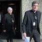 French bishop Eric de Moulins Beaufort, right, arrives to a press conference in Lourdes, southwestern France, Saturday, Nov. 9, 2019. 120 bishops are convening for their biannual assembly in Lourdes, where they will discuss the plan for a &amp;quot;financial gesture&amp;quot; toward victims of sexual abuse by the clergy. (AP Photo/Bob Edme)