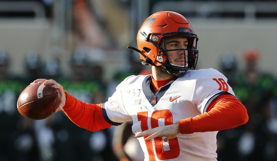 Illinois quarterback Brandon Peters throws during the first half of an NCAA college football game against Michigan State, Saturday, Nov. 9, 2019, in East Lansing, Mich. (AP Photo/Carlos Osorio)