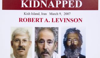 In this March 6, 2012, file photo, an FBI poster showing a composite image of former FBI agent Robert Levinson, right, of how he would look like now after five years in captivity, and an image, center, taken from the video, released by his kidnappers, and a picture before he was kidnapped, left, displayed during a news conference in Washington. Iran is acknowledging for the first time it has an open case before its Revolutionary Court over the 2007 disappearance of a former FBI agent on an unauthorized CIA mission to the country. In a filing to the United Nations, Iran said the case over Robert Levinson was &amp;quot;on going,&amp;quot; without elaborating. The Associated Press obtained the text of the filing Saturday, Nov. 9, 2019. (AP Photo/Manuel Balce Ceneta, File)