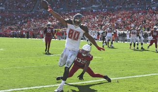 Tampa Bay Buccaneers tight end O.J. Howard (80) scores past Arizona Cardinals cornerback Byron Murphy (33) on a 10-yard touchdown reception during the first half of an NFL football game Sunday, Nov. 10, 2019, in Tampa, Fla. (AP Photo/Jason Behnken) ** FILE **
