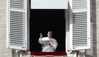 Pope Francis delivers his message during his Angelus prayer from his studio window overlooking St. Peter&#39;s Square, at the Vatican, Sunday, Nov. 10, 2019. (AP Photo/Gregorio Borgia)