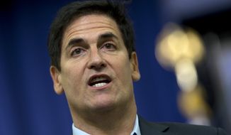 In this May 11, 2015, file photo, Dallas Mavericks basketball team owner Mark Cuban answers questions from the audience before President Barack Obama spoke in the South Court Auditorium of the Eisenhower Executive Office Building on the White House complex in Washington. The NBA has fined Mark Cuban for commenting about the team&#39;s agreements with DeAndre Jordan and Wes Matthews during the league&#39;s free agent moratorium. NBA spokesman Tim Frank confirmed the penalty, which ESPN.com reported Tuesday, July 7, 2015,  was for $25,000. (AP Photo/Carolyn Kaster), File