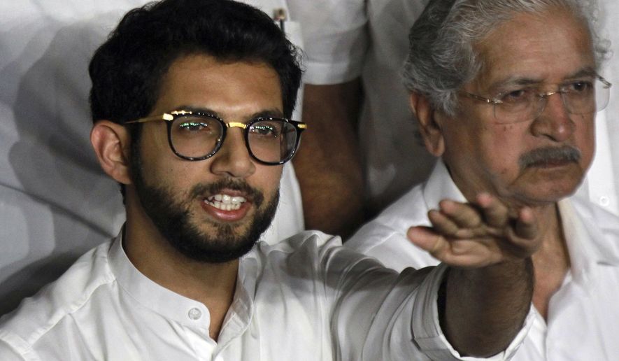 Shiv Sena leader Aditya Thackeray speaks to the media at the Maharashtra state Governor's residence in Mumbai, India, Monday, Nov. 11, 2019. Indian Prime Minister Narendra Modi's governing party has suffered a big setback in western Maharashtra state after its longtime ally Shiv Sena broke away and joined two other parties to form the new state government. (AP Photo/Rajanish Kakade)