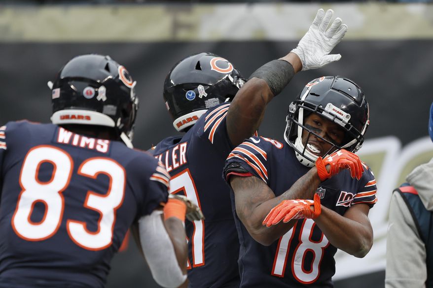 Chicago Bears wide receiver Taylor Gabriel (18) celebrates his 24-yard touchdown reception against the Detroit Lions during the second half of an NFL football game in Chicago, Sunday, Nov. 10, 2019. (AP Photo/Charlie Neibergall)