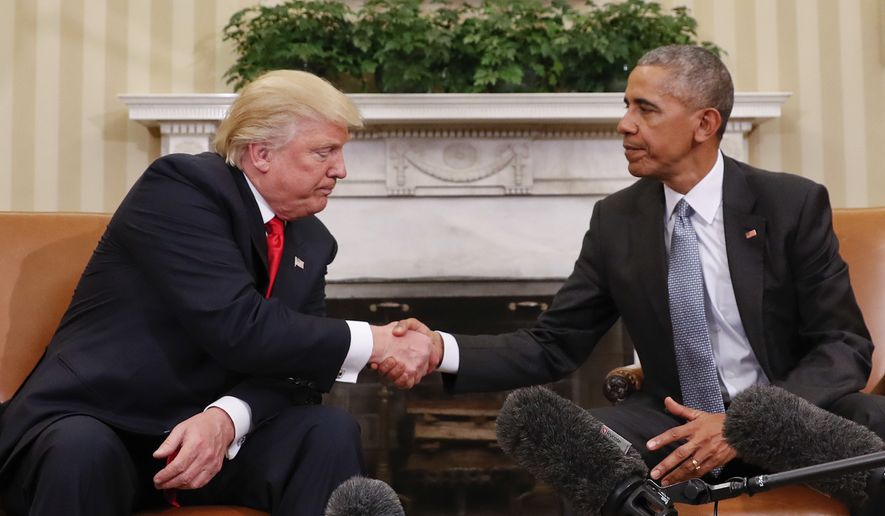 President Barack Obama and President-elect Donald Trump shake hands following their meeting in the Oval Office of the White House in Washington, Thursday, Nov. 10, 2016. (AP Photo/Pablo Martinez Monsivais) ** FILE **