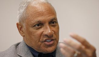 Mississippi Democrat Mike Espy explains, Tuesday, Nov. 12, 2019, at his Jackson, Miss., office, how he is using data to help him pursue votes in a run for the U.S. Senate against Republican incumbent Cindy Hyde-Smith, setting up a 2020 rematch of their 2018 special election to fill the last two years of retired Republican Sen. Thad Cochran&#39;s six-year term. Espy announced Tuesday that he&#39;s running again for U.S. Senate in Mississippi. (AP Photo/Rogelio V. Solis)