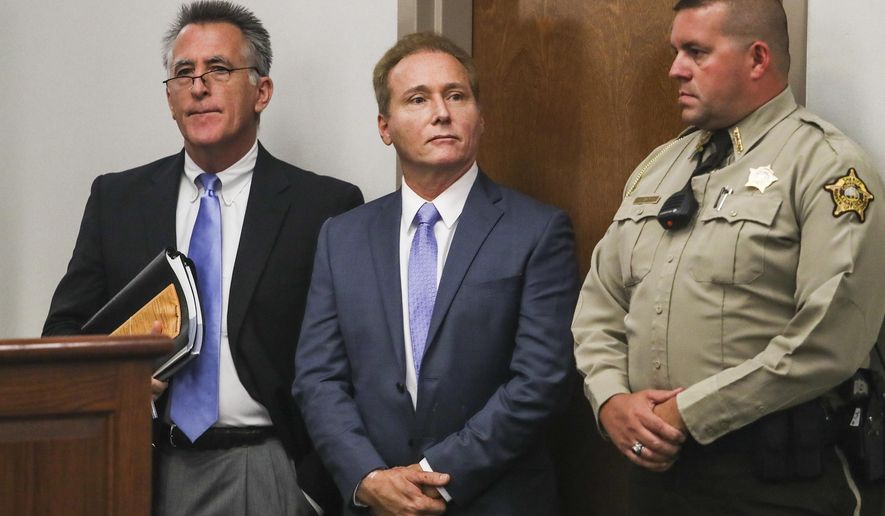 FILE - In this Nov. 9, 2017, file photo, Rene Boucher, center, appears in court for an arraignment hearing with his attorney Matt Baker, left, at the Warren County Justice Center in Bowling Green, Ky. Boucher who tackled U.S. Sen. Rand Paul and broke his ribs has asked for the Supreme Court’s opinion after an appellate court vacated his 30-day jail sentence and suggested it was too lenient. A three-judge panel of the 6th U.S. Circuit Court of Appeals ruled in September 2019 that there was “no compelling justification” for Rene Boucher’s sentence. The judges called the sentence "well-below-guidelines" and ordered a resentencing. (Austin Anthony /Daily News via AP, File)