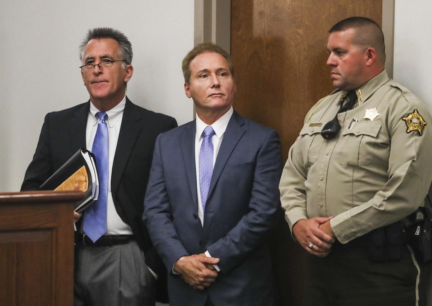 FILE - In this Nov. 9, 2017, file photo, Rene Boucher, center, appears in court for an arraignment hearing with his attorney Matt Baker, left, at the Warren County Justice Center in Bowling Green, Ky. Boucher who tackled U.S. Sen. Rand Paul and broke his ribs has asked for the Supreme Court’s opinion after an appellate court vacated his 30-day jail sentence and suggested it was too lenient. A three-judge panel of the 6th U.S. Circuit Court of Appeals ruled in September 2019 that there was “no compelling justification” for Rene Boucher’s sentence. The judges called the sentence "well-below-guidelines" and ordered a resentencing. (Austin Anthony /Daily News via AP, File)