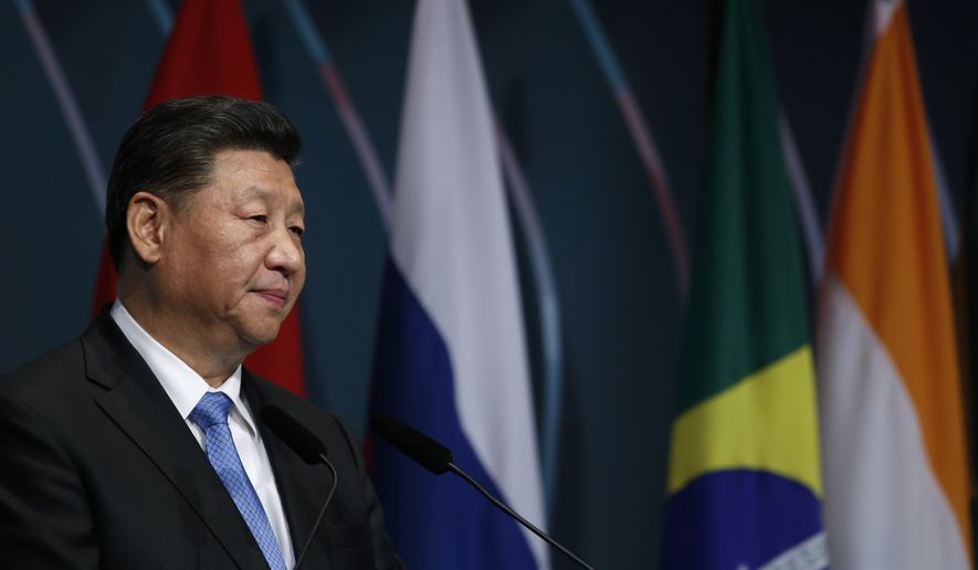 China&#39;s President Xi Jinping speaks during the BRICS Business Council prior the 11th edition of the BRICS Summit, in Brasilia, Brazil, Wednesday, Nov. 13, 2019. The BRICS Summit gathers the group of countries formed by Brazil, Russia, India, China and South Africa, which will take place in the 13th and 14th of this month. (AP Photo/Eraldo Peres)