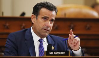 Outgoing Director of National Intelligence John Ratcliffe has accused U.S. intelligence analysts of playing down China&#39;s role in interference with the Nov. 3 presidential election. (Associated Press/File)