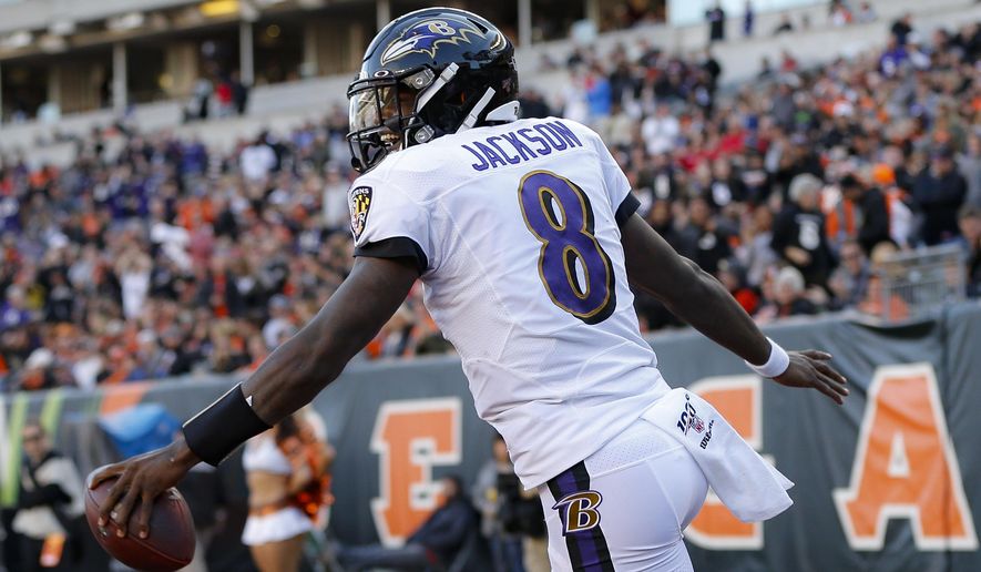 Baltimore Ravens quarterback Lamar Jackson celebrates his touchdown during the second half of NFL football game against the Cincinnati Bengals, Sunday, Nov. 10, 2019, in Cincinnati. (AP Photo/Frank Victores)