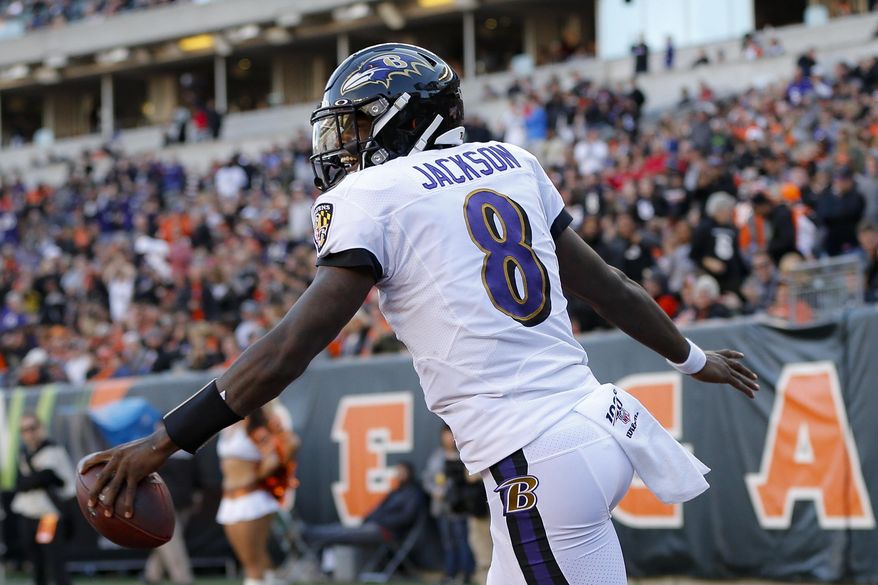 Baltimore Ravens quarterback Lamar Jackson celebrates his touchdown during the second half of NFL football game against the Cincinnati Bengals, Sunday, Nov. 10, 2019, in Cincinnati. (AP Photo/Frank Victores)