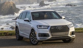 This undated photo provided by Audi shows the 2019 Audi Q7, a midsize three-row luxury SUV. The Q7 boasts impressive technology and safety features plus a quiet and user-friendly interior. (Jim Fets/Audi AG via AP)