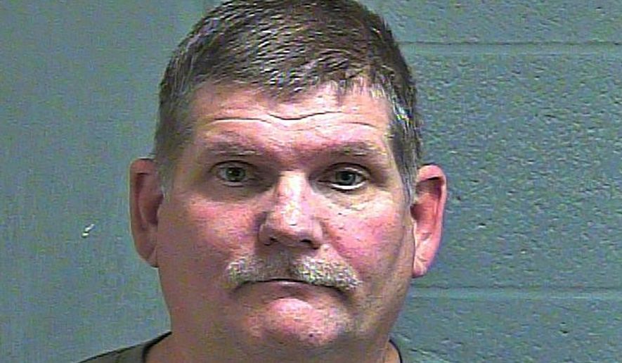This undated photo provided by the Oklahoma County Sheriff's Office shows Timothy Harper. Harper, a self-described Second Amendment "auditor" was arrested Tuesday, Nov. 12, 2019, after being accused of illegally taking a rifle into an Oklahoma City restaurant. (Oklahoma County Sheriff's Office via AP)