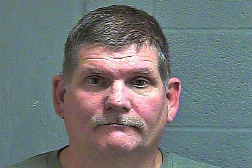 This undated photo provided by the Oklahoma County Sheriff's Office shows Timothy Harper. Harper, a self-described Second Amendment "auditor" was arrested Tuesday, Nov. 12, 2019, after being accused of illegally taking a rifle into an Oklahoma City restaurant. (Oklahoma County Sheriff's Office via AP)